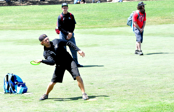 Jared Roan approaches as Ricky Wysocki looks on at the St. Jude Disc Golf Charity Invitational. Photo: PDGA