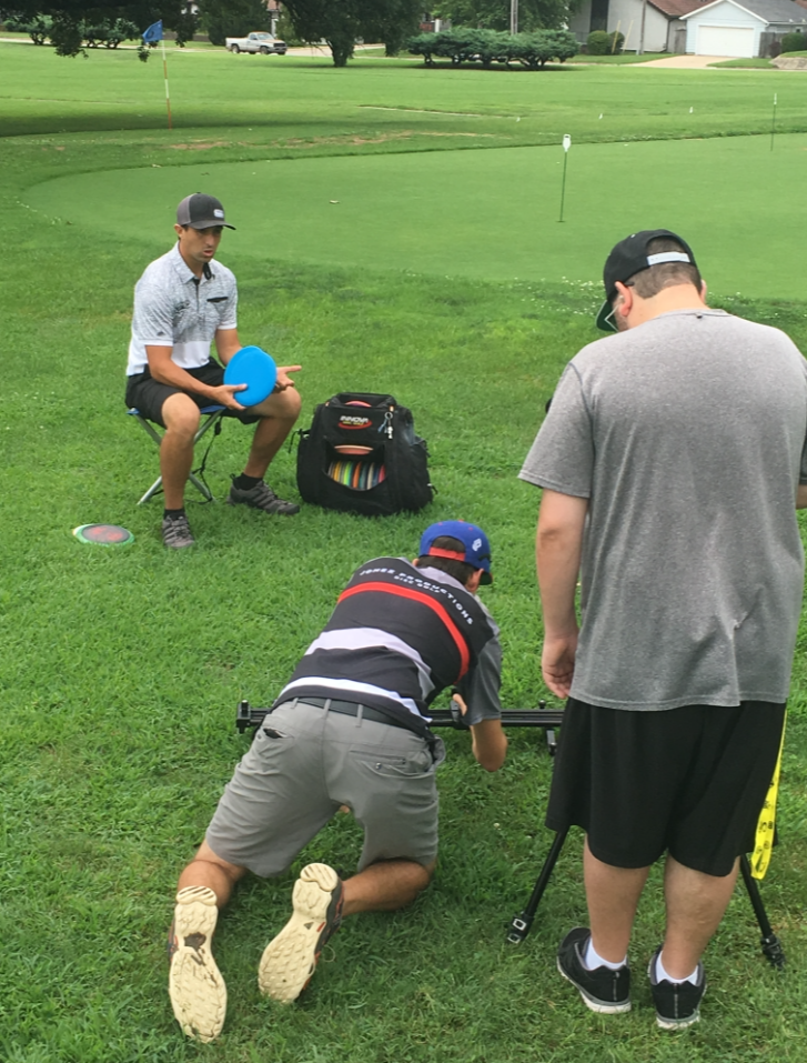 Jonathan Gomez (middle) and Michael Fouche (right) film their Paul McBeth "In the Bag" video before Pro Worlds. Photo: Jomez Productions